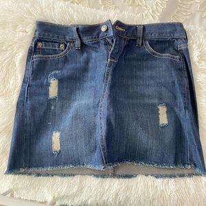 Denim skirt with rips